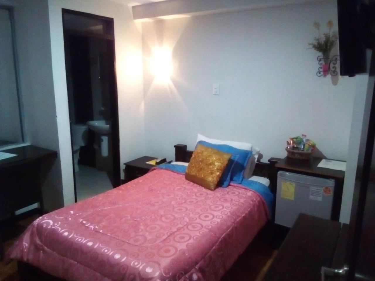 Hotel Royal Suite มานิซาเลส ภายนอก รูปภาพ