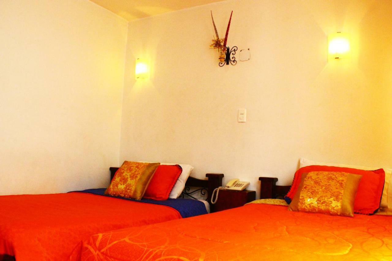 Hotel Royal Suite มานิซาเลส ภายนอก รูปภาพ